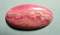 Rodokrozit cabochon - Fot: R.Weller/Cochise College